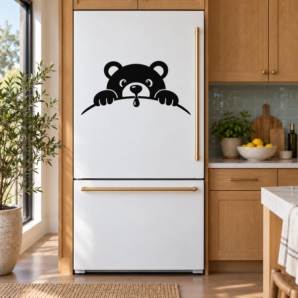Refrigerator vinyl decal of a black bear peeking over a line