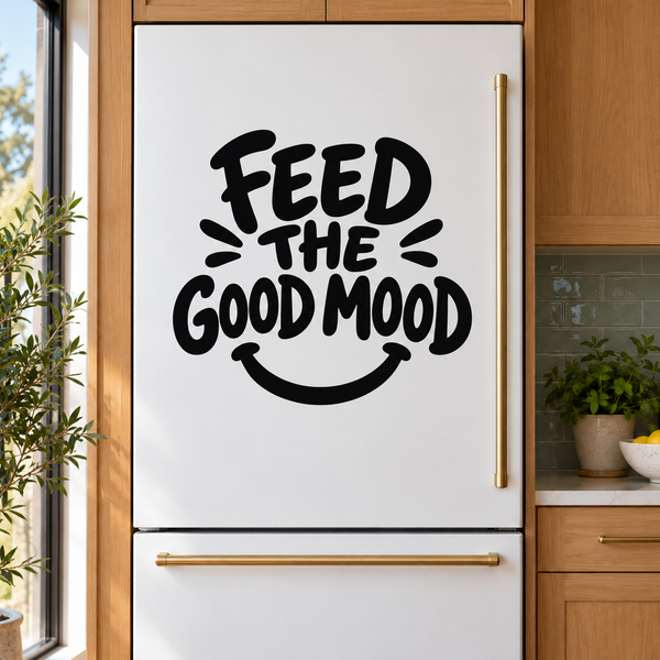 Vinyl decal: bold black 'FEED THE GOOD MOOD' smile graphic on a refrigerator door.