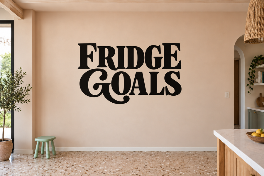 Vinyl refrigerator decal with "FRIDGE GOALS" bold black lettering