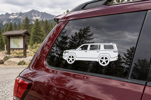Rivian R1S side profile vinyl decal on vehicle window, white SUV graphic with star wheels