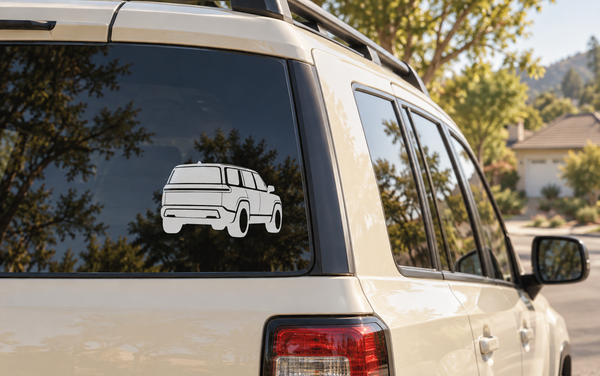 Rivian R1S rear three-quarter vinyl decal with white outline vehicle on rear window