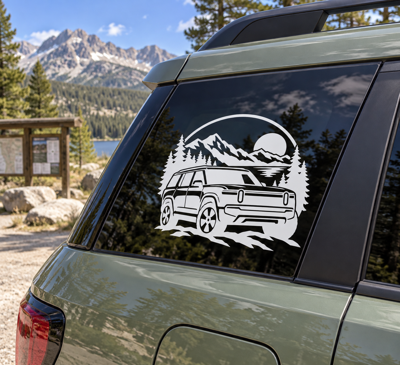 Vinyl car window decal with white off-road SUV, mountains, pine trees, and sun