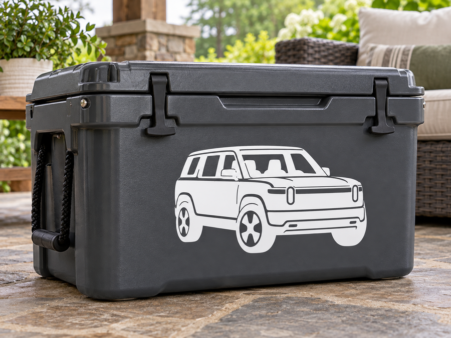 Vinyl decal with white Rivian R2 front three-quarter vehicle graphic on dark gray
