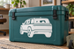 Rivian R2 vinyl decal of white side van silhouette on teal surface