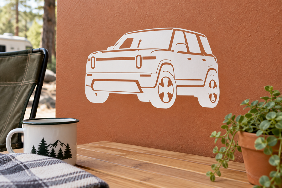 Vinyl car decal of Rivian R2 in low front angle view, white line art