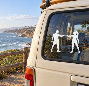 Vinyl decal of two rock climber silhouettes holding hands