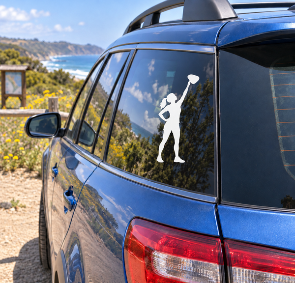 Vinyl decal of a rock climber reaching upward on car window glass