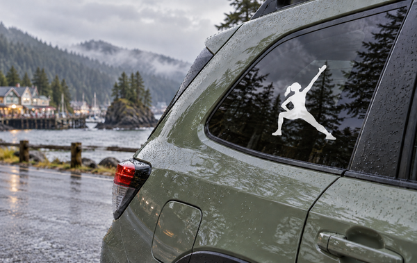 Rock climbing vinyl decal of a white climber silhouette on a car window