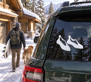 Rock climbing shoe vinyl decal pair on car window, white shoe icons