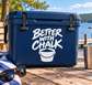 Rock climbing vinyl decal on a blue cooler: “BETTER WITH CHALK” with chalk bucket icon.