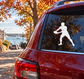 Rugby player vinyl decal silhouette on a car window, black figure holding a ball