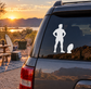 Rugby player vinyl decal silhouette on car window, white figure with ball