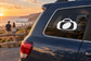 White kit bag vinyl decal on dark vehicle window