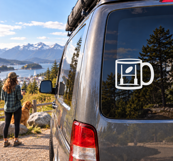 White coffee mug vinyl decal with black outline on car window