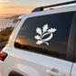 Vinyl decal of oak leaf emblem with acorn, white design on dark surface