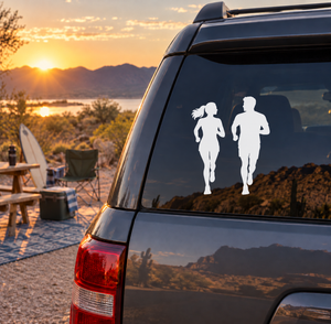 Car window vinyl decal with two white running silhouette figures