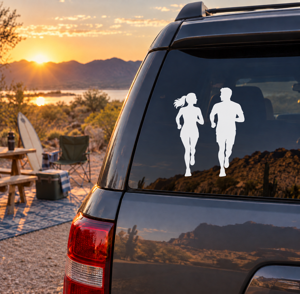 Car window vinyl decal with two white running silhouette figures