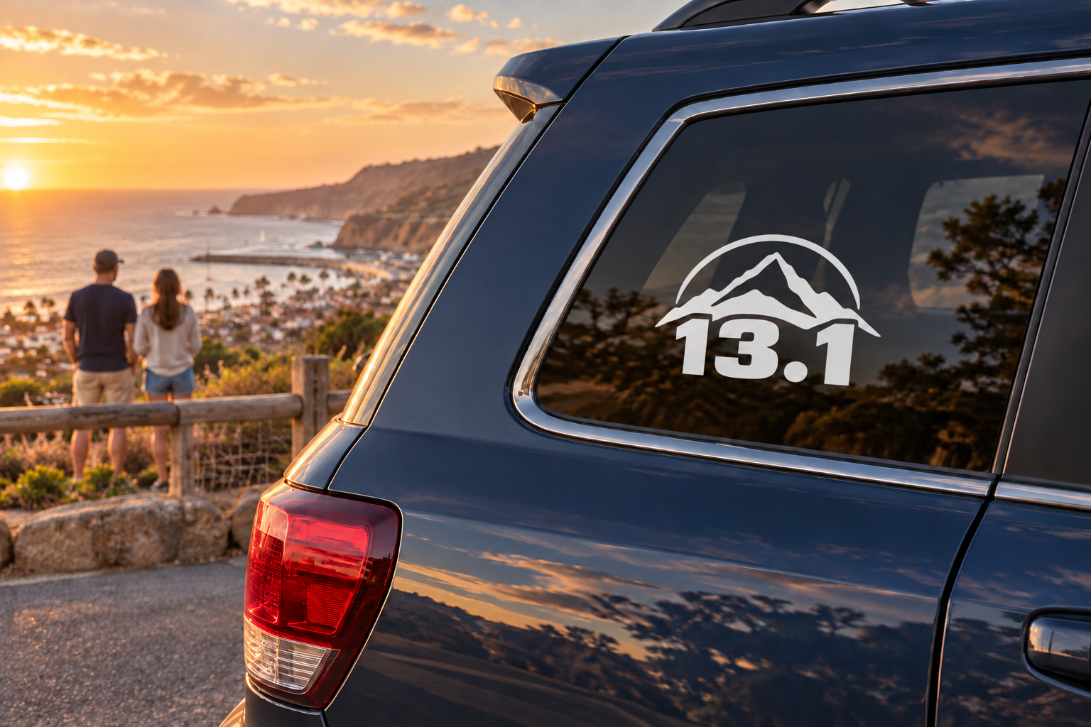 Running half marathon vinyl decal with mountain icon and '13.1' on car window