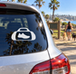 Vinyl decal with running bag icon on car window glass