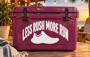 Maroon vinyl decal text "LESS RUSH MORE RUN" with running shoe graphic