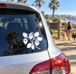 Car window vinyl decal with white heart-and-leaf branch design