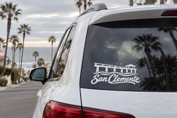San Clemente pier and wordmark vinyl decal on car rear window, white design