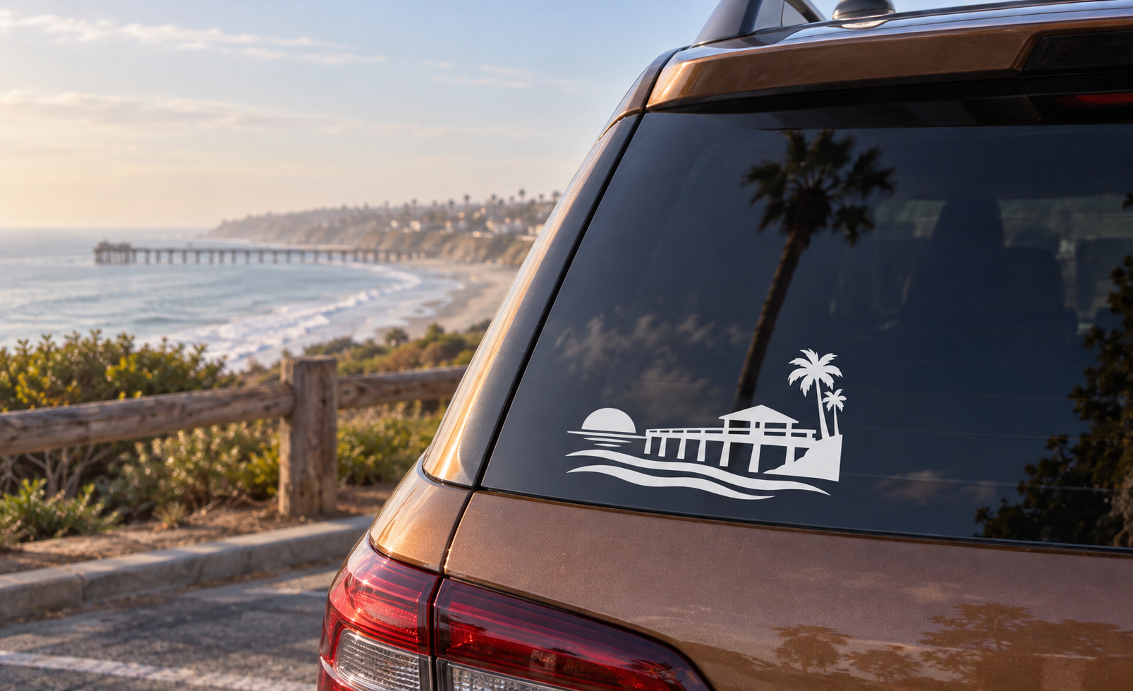Pier sunset vinyl decal: ocean waves, pier silhouette, palm trees on car window