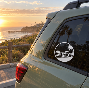 San Clemente Pier vinyl decal, circular black-and-white crest on car window