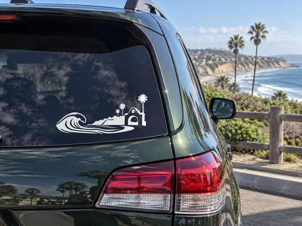 San Clemente wave and arch horizon vinyl decal, white outline on car window