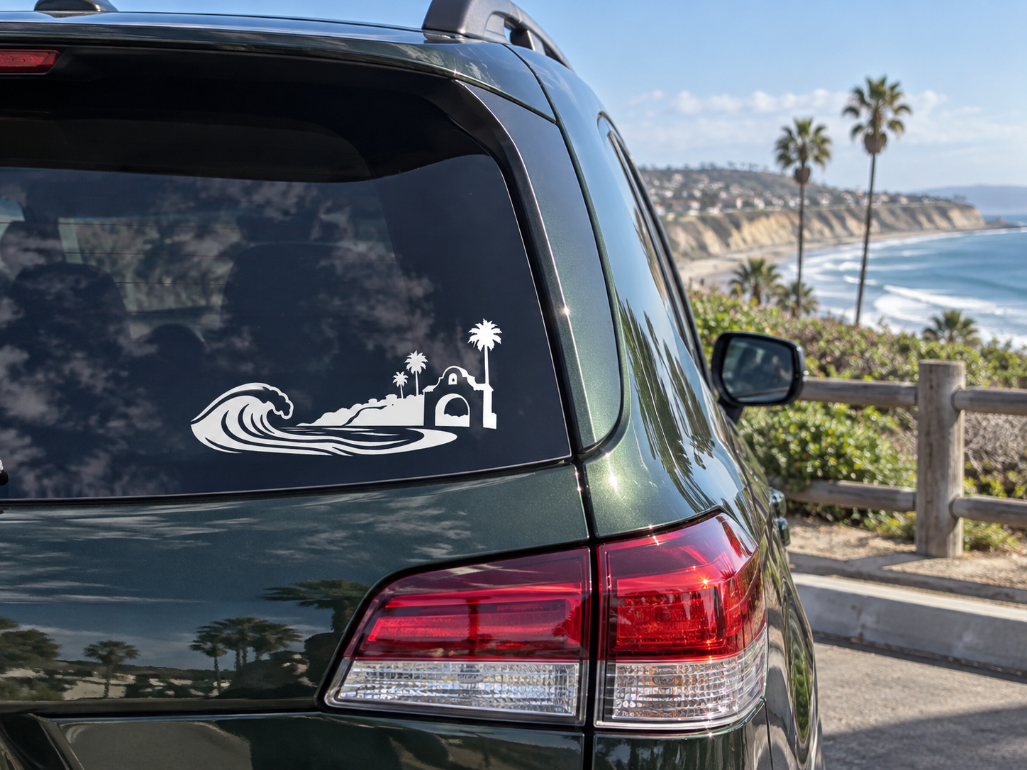 San Clemente wave and arch horizon vinyl decal, white outline on car window