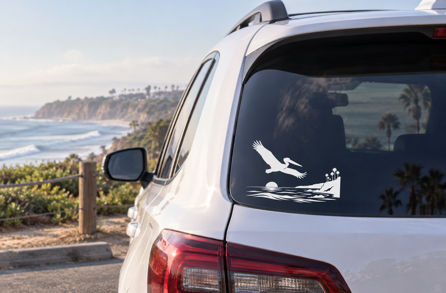 Black vinyl decal of a flying pelican on a car window