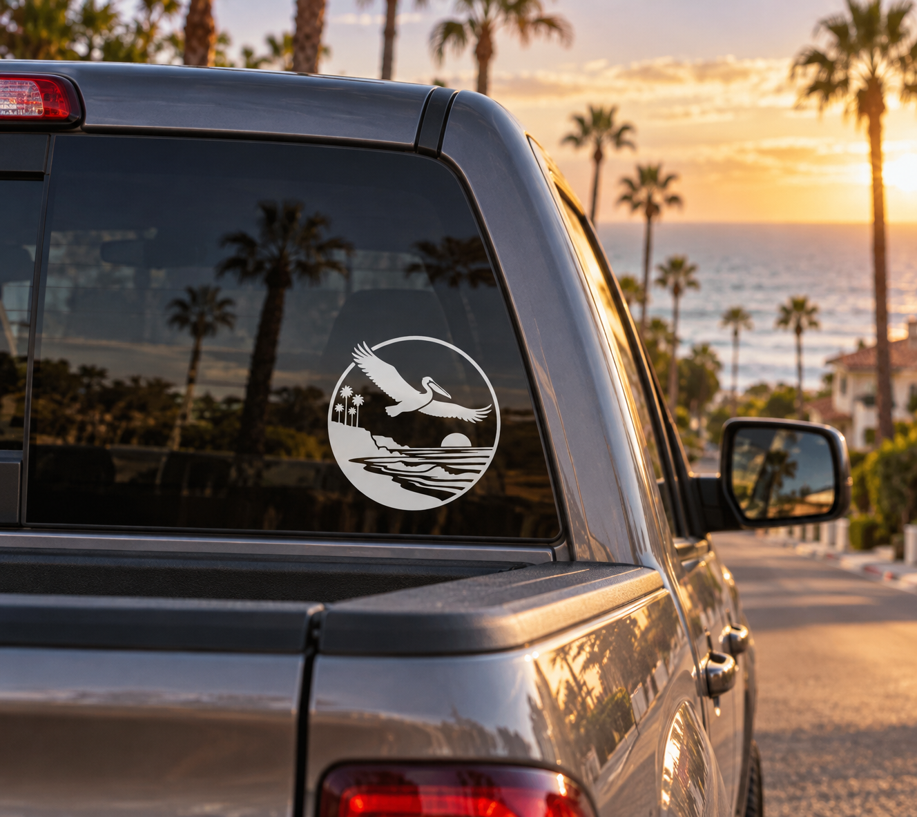 Vinyl decal pelican crest for car window, white bird over coastline and palm silhouettes