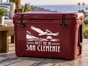 White vinyl decal text "MEET ME IN SAN CLEMENTE" with seagull and wave icons