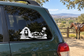 Vinyl decal of mission bell silhouette on car rear side window