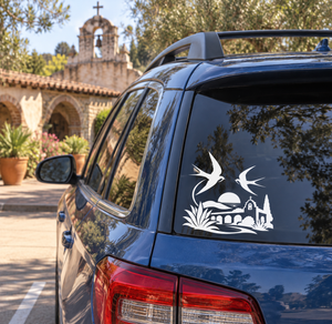 Car rear window vinyl decal with two swallow silhouettes and church sunset scene