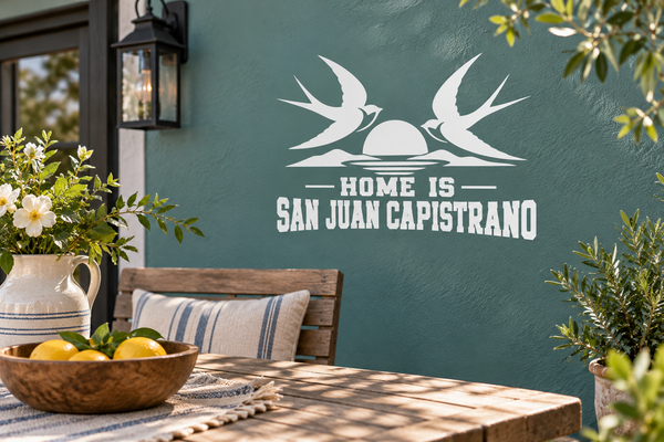 Vinyl wall decal reading 'HOME IS SAN JUAN CAPISTRANO' with dove bird silhouettes