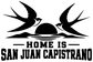 Vinyl wall decal with two dove silhouettes and 'HOME IS SAN JUAN CAPISTRANO' text