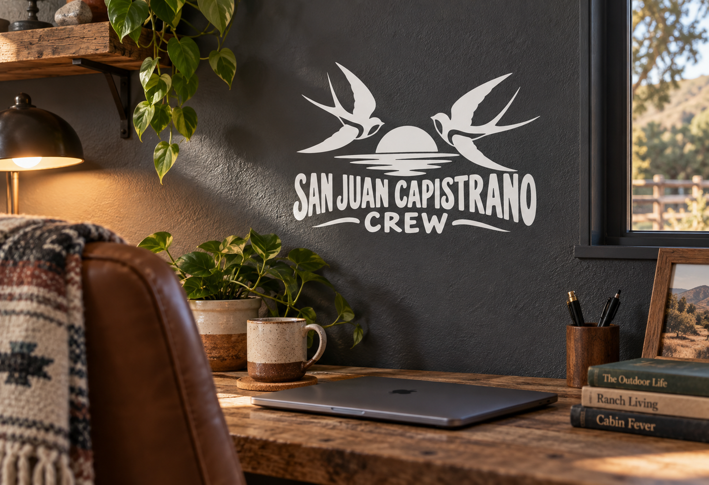 San Juan Capistrano Crew vinyl decal with bird wings and bold lettering in white