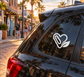 Heart vinyl decal shaped like a paperclip with leaf detail, white outline