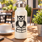 Owl vinyl decal on white bottle: black owl with stacked books