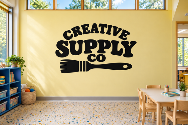Black vinyl decal with 'CREATIVE SUPPLY CO' lettering and paint-roller icon