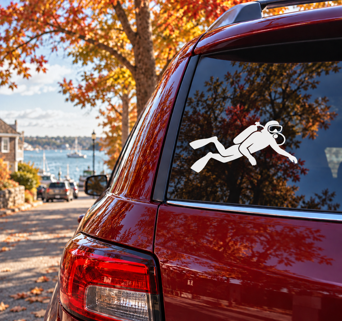 Scuba diving vinyl decal with white diver icon on a car window