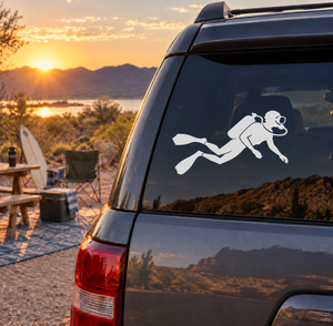 Scuba diving vinyl decal of two diver silhouettes on a car rear window