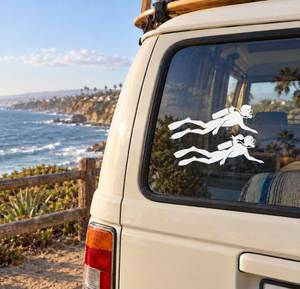 Scuba diving buddy vinyl decal of two divers swimming on car window, white