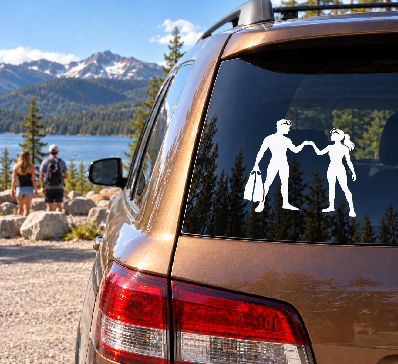 Scuba diving vinyl decal of two divers holding hands on a car window
