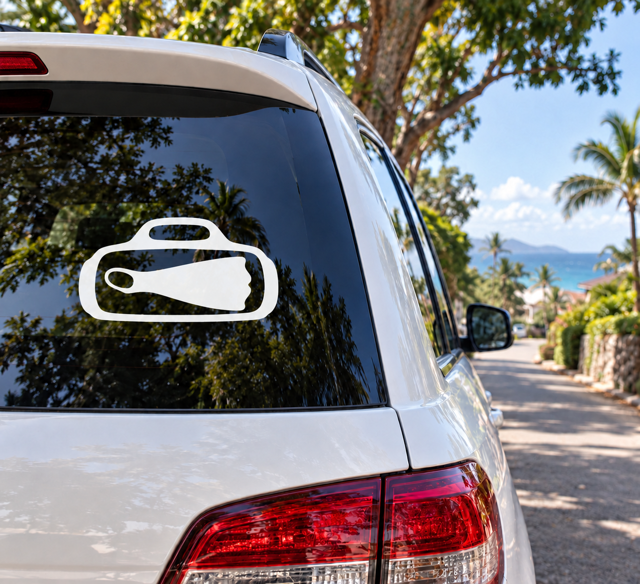 Scuba diving gear bag vinyl decal on car rear window, white outline with icon