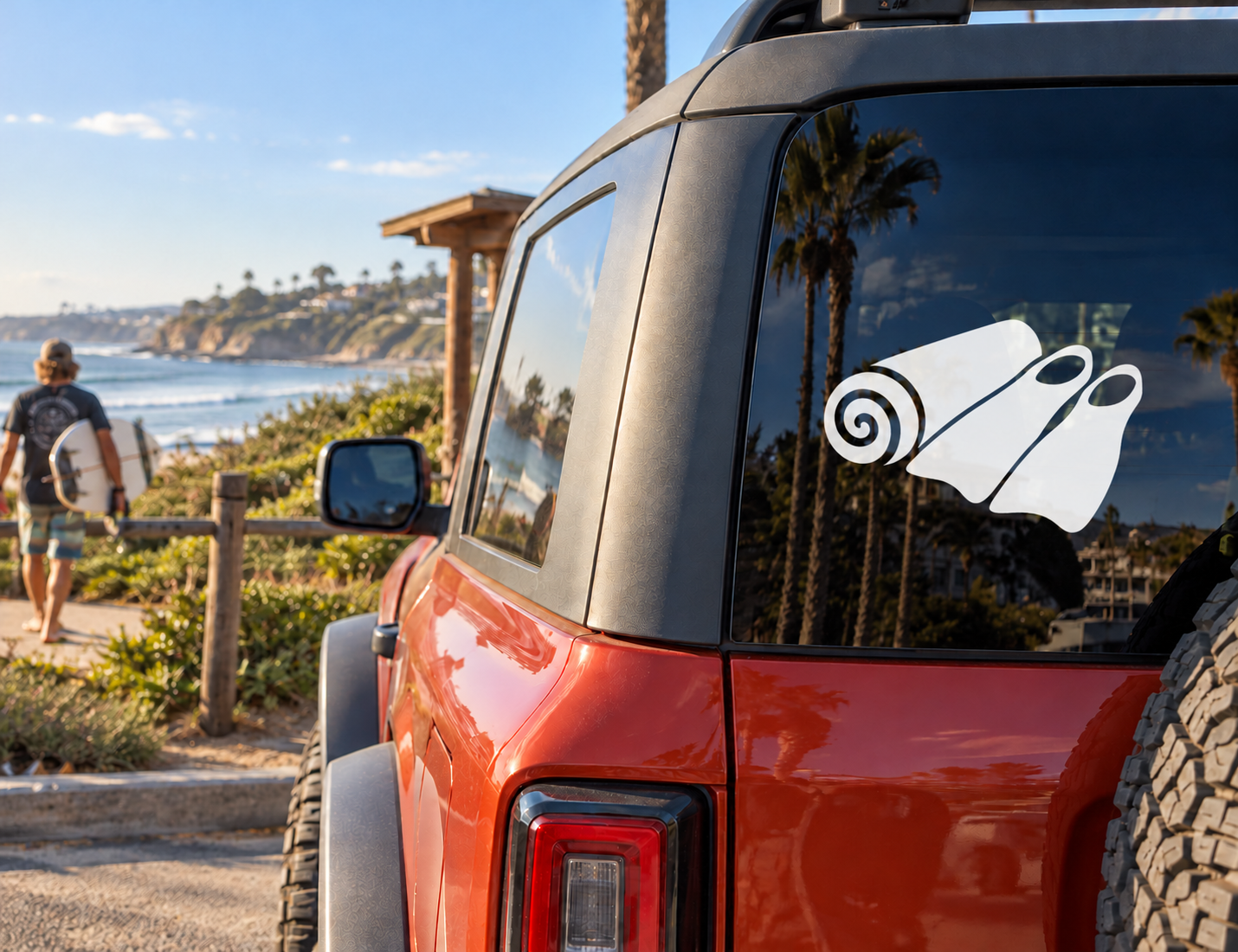 Scuba diving towel vinyl decal on car rear window, black-and-white towel with swirl