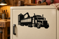 Black farm grain truck vinyl decal on cabinet door, side view of semi-truck