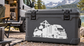 Vinyl decal on dark container: white semi truck with port crane graphic