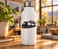 Vinyl decal graphic of semi truck with double trailers on a white bottle